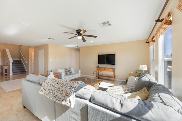 living room featuring ceiling fan