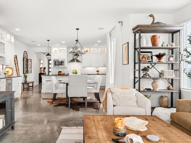 3711 Garden Villa Ln Unit A, Austin, TX 78704 - living area featuring wine cooler, concrete flooring, a chandelier, and recessed lighting