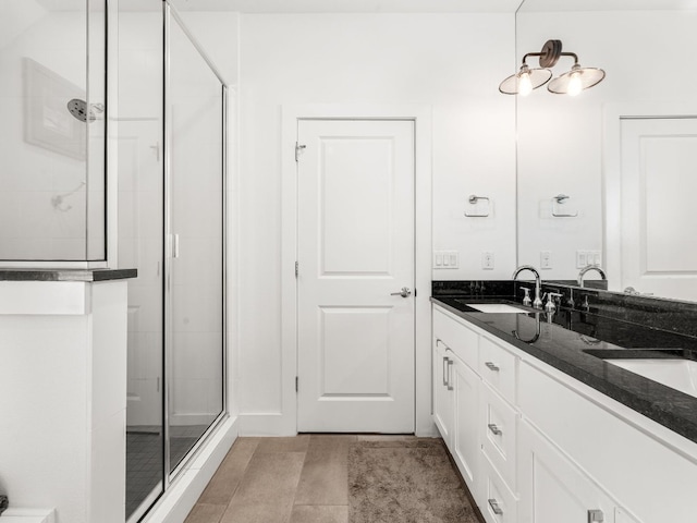 3711 Garden Villa Ln Unit A, Austin, TX 78704 - bathroom with double vanity and a shower stall
