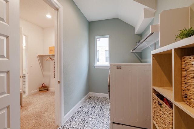 washroom with washer / clothes dryer