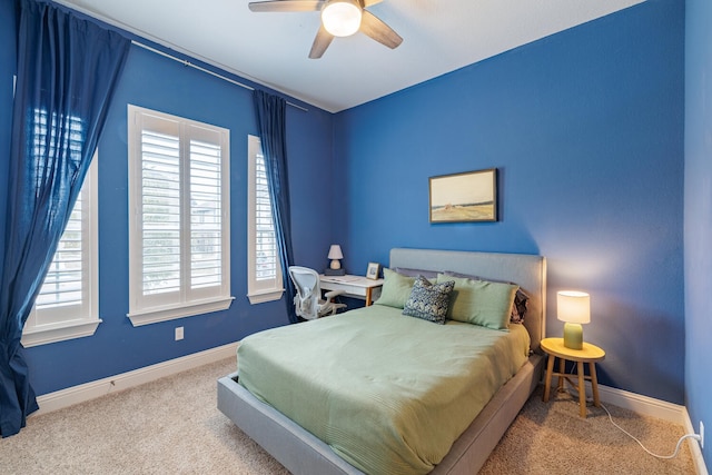 bedroom with ceiling fan and carpet