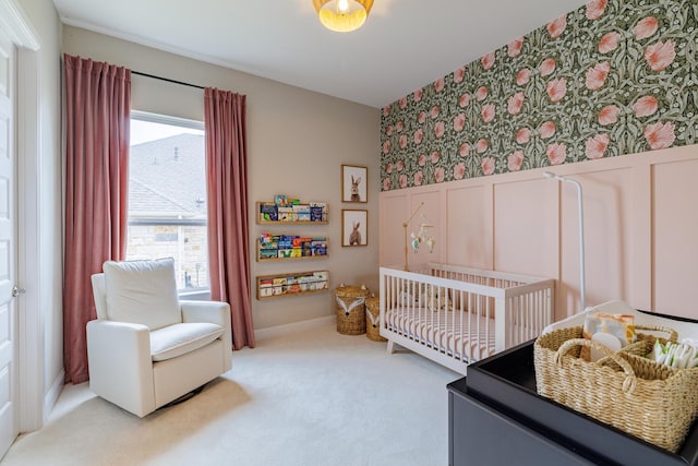 carpeted bedroom with a crib