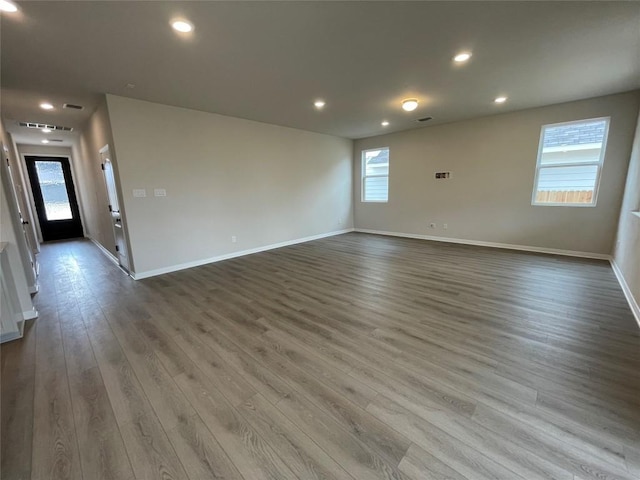 unfurnished room featuring light wood-type flooring