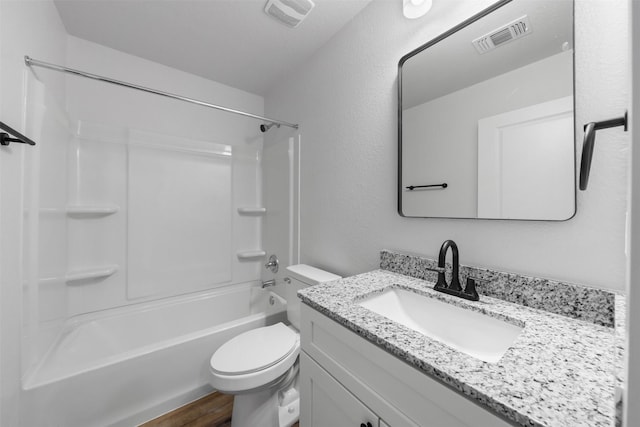 full bathroom with washtub / shower combination, vanity, toilet, and wood-type flooring