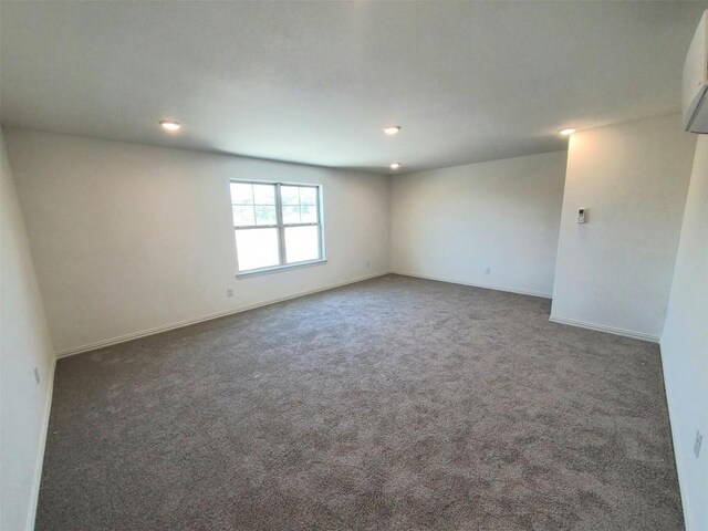 1501 Cole Estates Dr, Georgetown, TX 78628 - carpeted empty room with recessed lighting