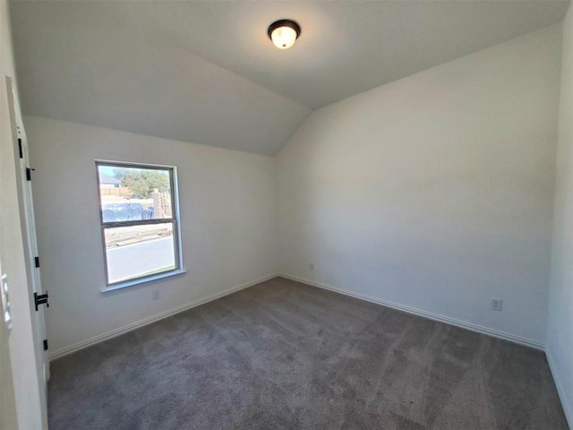 1501 Cole Estates Dr, Georgetown, TX 78628 - unfurnished room with dark carpet and vaulted ceiling