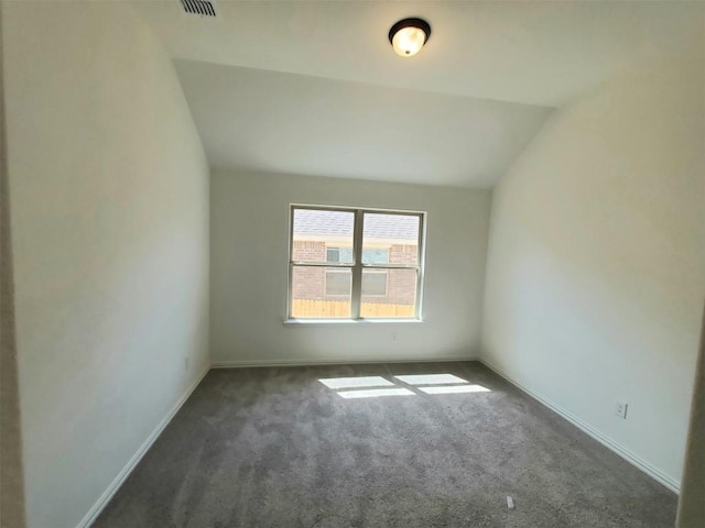 1501 Cole Estates Dr, Georgetown, TX 78628 - carpeted spare room featuring vaulted ceiling and baseboards