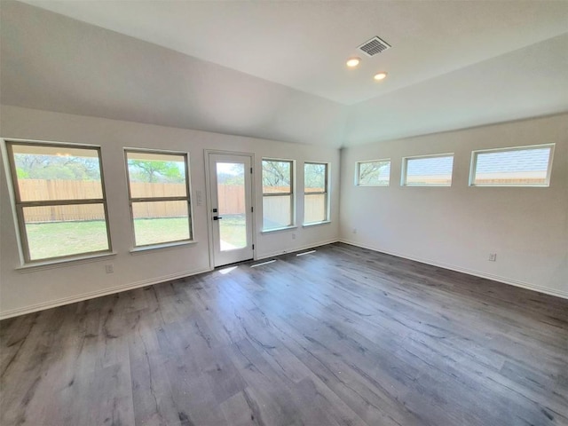 1501 Cole Estates Dr, Georgetown, TX 78628 - unfurnished room with healthy amount of natural light, dark wood finished floors, lofted ceiling, baseboards, and recessed lighting