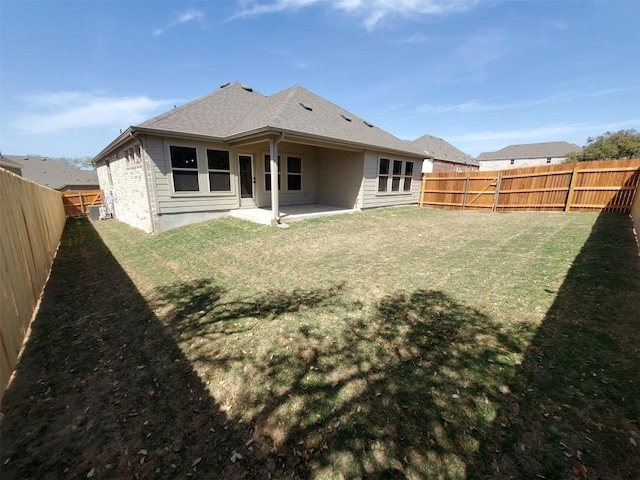 1501 Cole Estates Dr, Georgetown, TX 78628 - back of house featuring a patio and a shingled roof