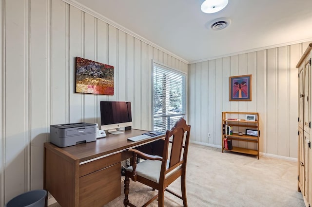 carpeted home office with ornamental molding