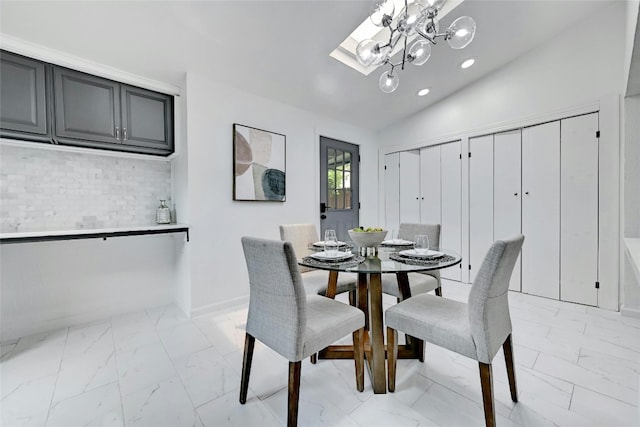 dining area featuring vaulted ceiling with skylight, baseboards, marble finish floor, a notable chandelier, and recessed lighting