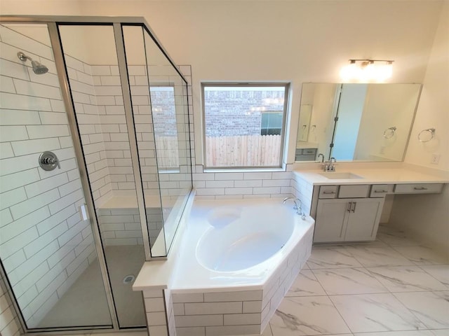 full bathroom with marble finish floor, vanity, a shower stall, and a bath