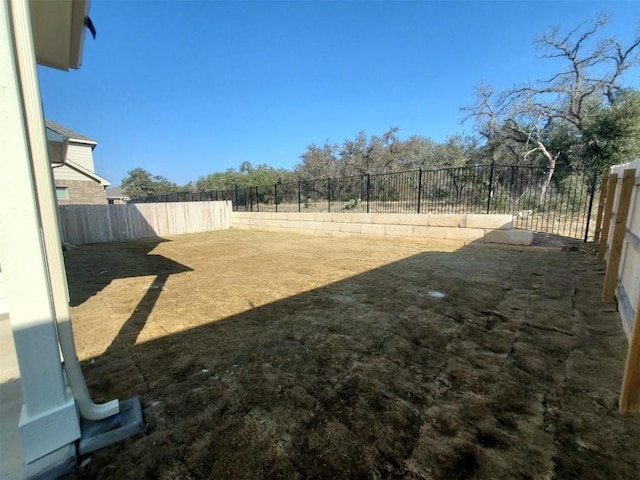 view of yard featuring a fenced backyard