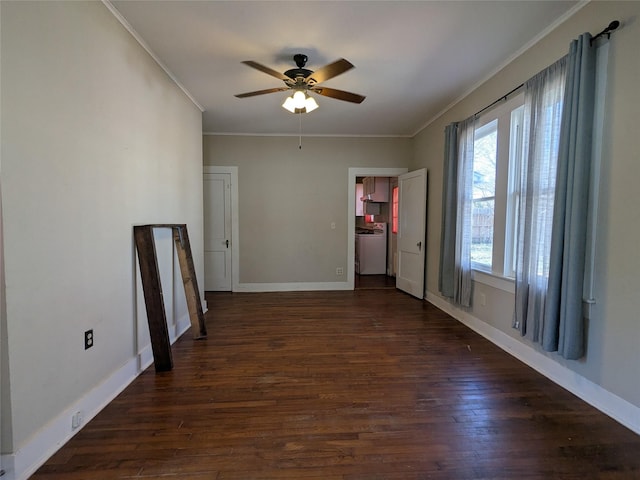 spare room featuring ornamental molding, ceiling fan, and dark hardwood / wood-style flooring