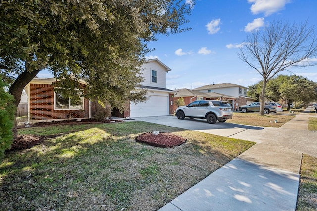 view of front of property featuring a garage and a front lawn