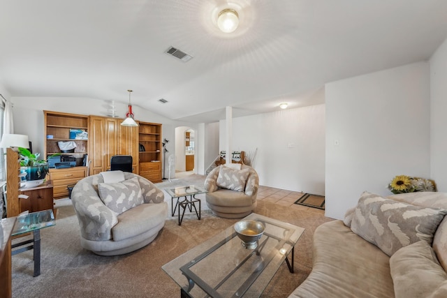 living room featuring vaulted ceiling and light colored carpet