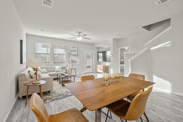 dining room featuring ceiling fan and light wood-type flooring