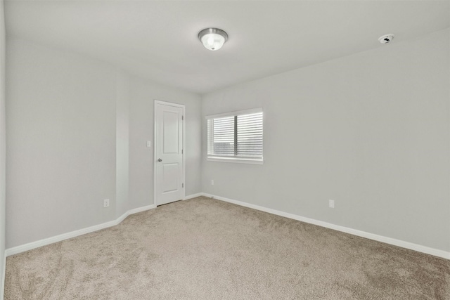19004 Quebrada Dr, Pflugerville, TX 78660 - empty room with light colored carpet and baseboards