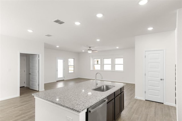 kitchen with a sink, a ceiling fan, stainless steel dishwasher, visible vents, and recessed lighting