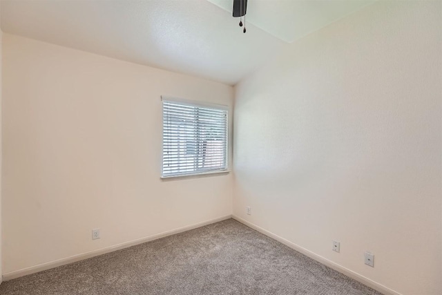 empty room with carpet flooring and baseboards