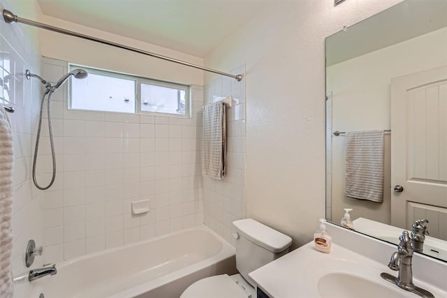 full bathroom featuring toilet, shower / bath combination, and vanity