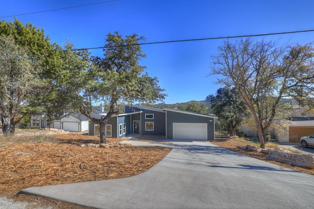 ranch-style home featuring a garage