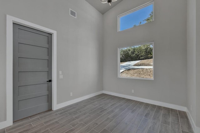 spare room featuring light wood-type flooring