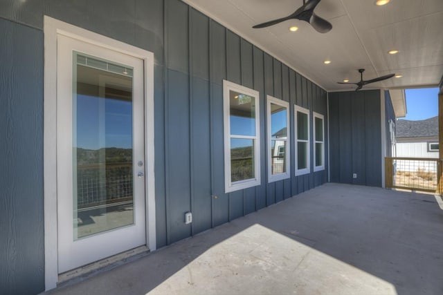 view of patio featuring ceiling fan