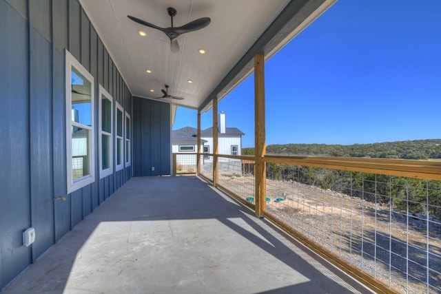 view of patio featuring ceiling fan