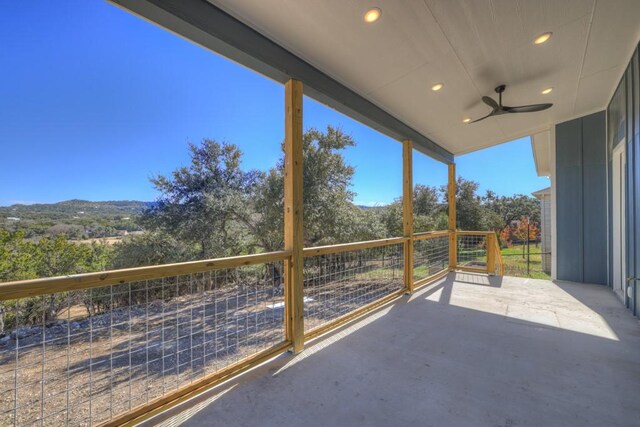 balcony featuring a patio and ceiling fan