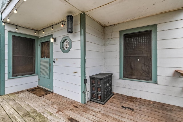 entrance to property featuring a deck