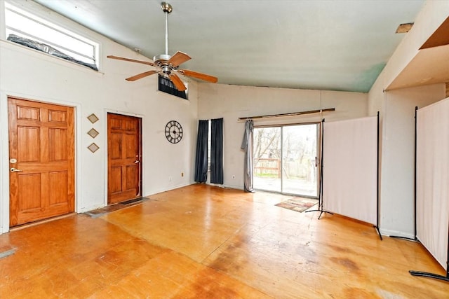 206 M L K Dr Unit B, Elgin, TX 78621 - empty room with ceiling fan and high vaulted ceiling