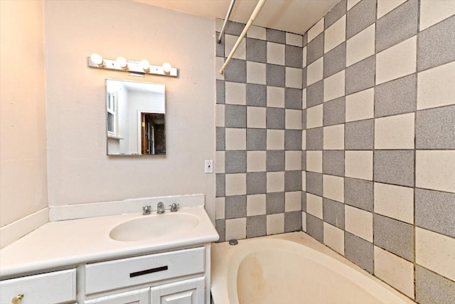206 M L K Dr Unit B, Elgin, TX 78621 - bathroom with vanity and a bathtub