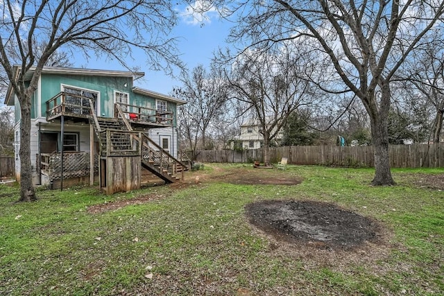 206 M L K Dr Unit B, Elgin, TX 78621 - view of yard featuring stairway and a wooden deck