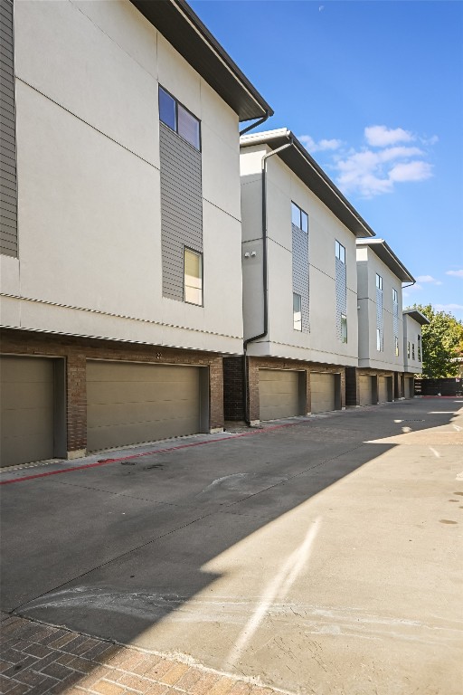 1702 S Lamar Blvd Unit 22, Austin, TX 78704 - view of property with a garage