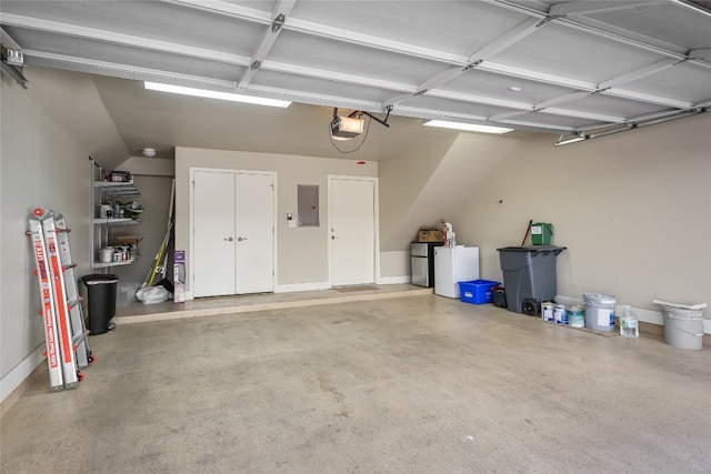 1702 S Lamar Blvd Unit 22, Austin, TX 78704 - garage with electric panel and a garage door opener