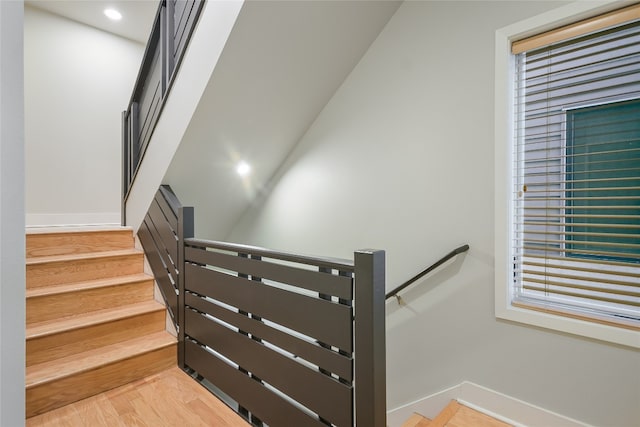 1702 S Lamar Blvd Unit 22, Austin, TX 78704 - stairway featuring wood finished floors and recessed lighting