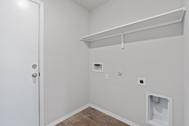 clothes washing area featuring laundry area, dark wood finished floors, gas dryer hookup, hookup for a washing machine, and hookup for an electric dryer