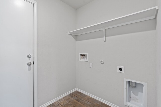 laundry room with hookup for a gas dryer, hookup for an electric dryer, dark wood-type flooring, and washer hookup