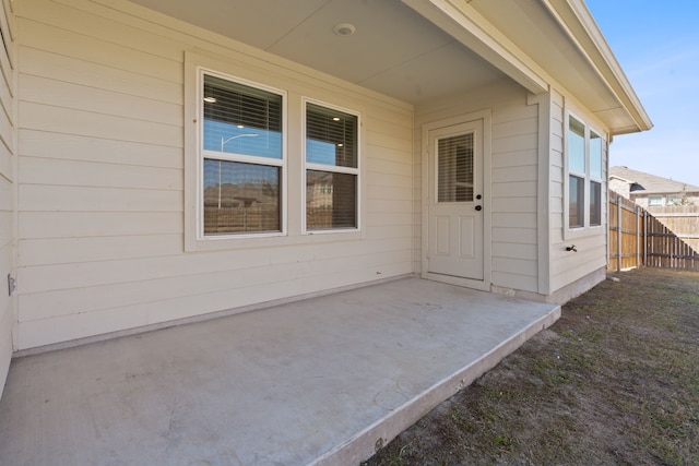 doorway to property featuring a patio area