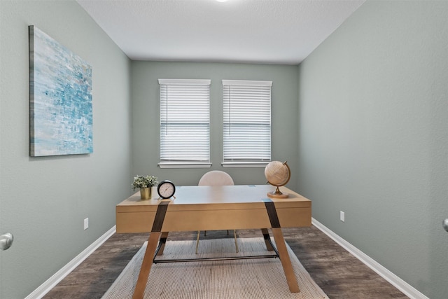 home office with hardwood / wood-style flooring