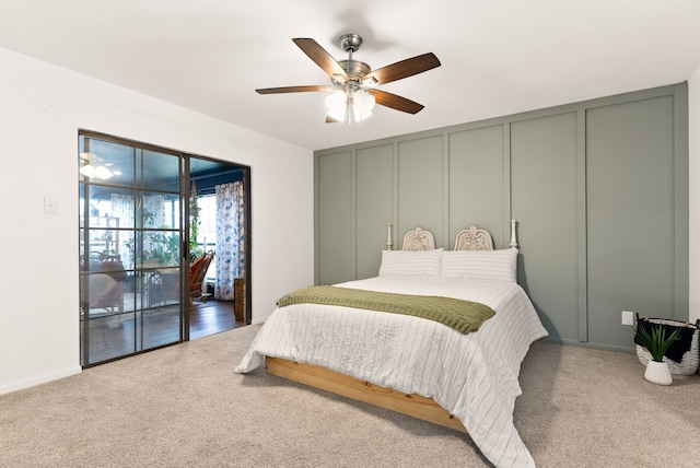 carpeted bedroom with access to outside and ceiling fan