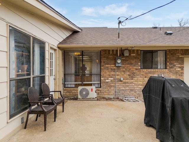 view of patio with ac unit and grilling area