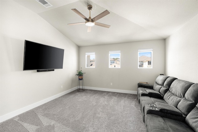 carpeted living room featuring vaulted ceiling and ceiling fan