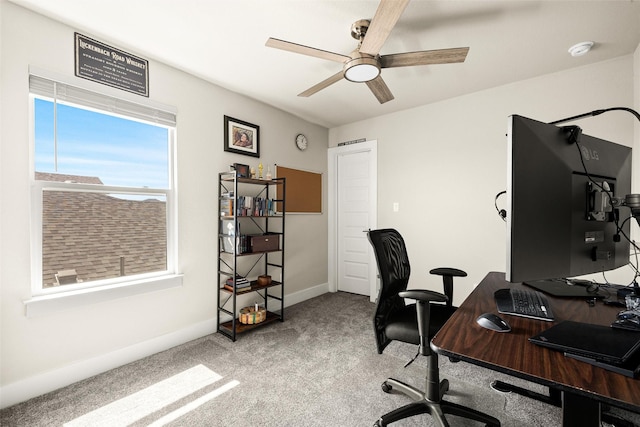 home office featuring carpet floors and ceiling fan