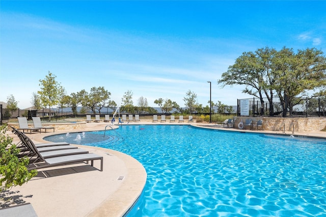 view of pool featuring a patio area