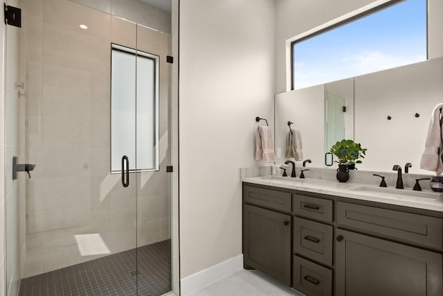 bathroom featuring vanity and walk in shower