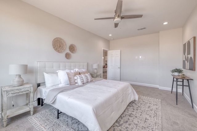 carpeted bedroom with ceiling fan