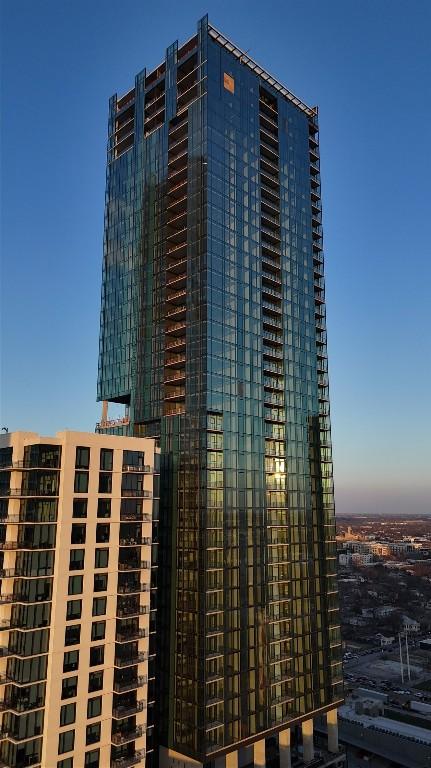 view of outdoor building at dusk