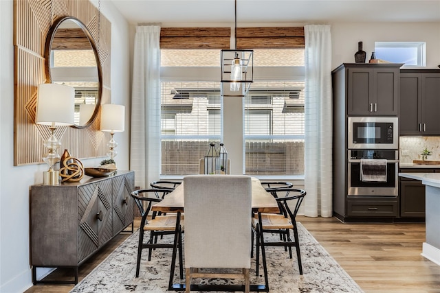 dining space featuring light hardwood / wood-style flooring